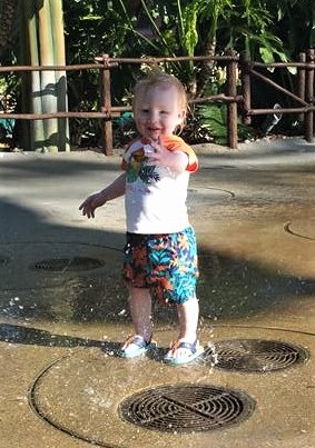 toddler, happy boy, splash pad